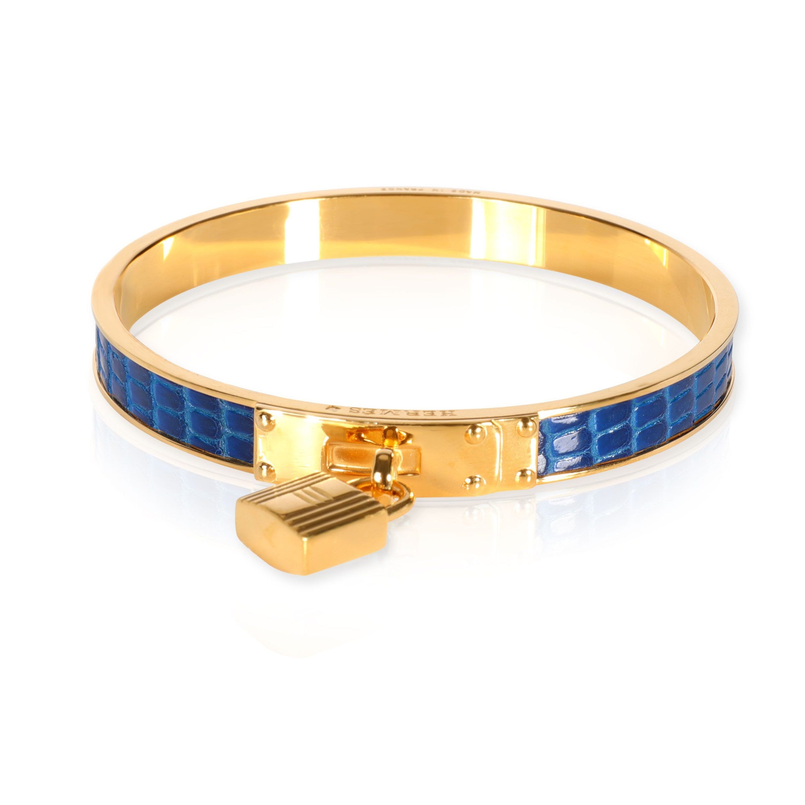 image of Hermes Gold-Plated Blue Lizard Kelly Lock Cadena Bangle in Yellow, Women's