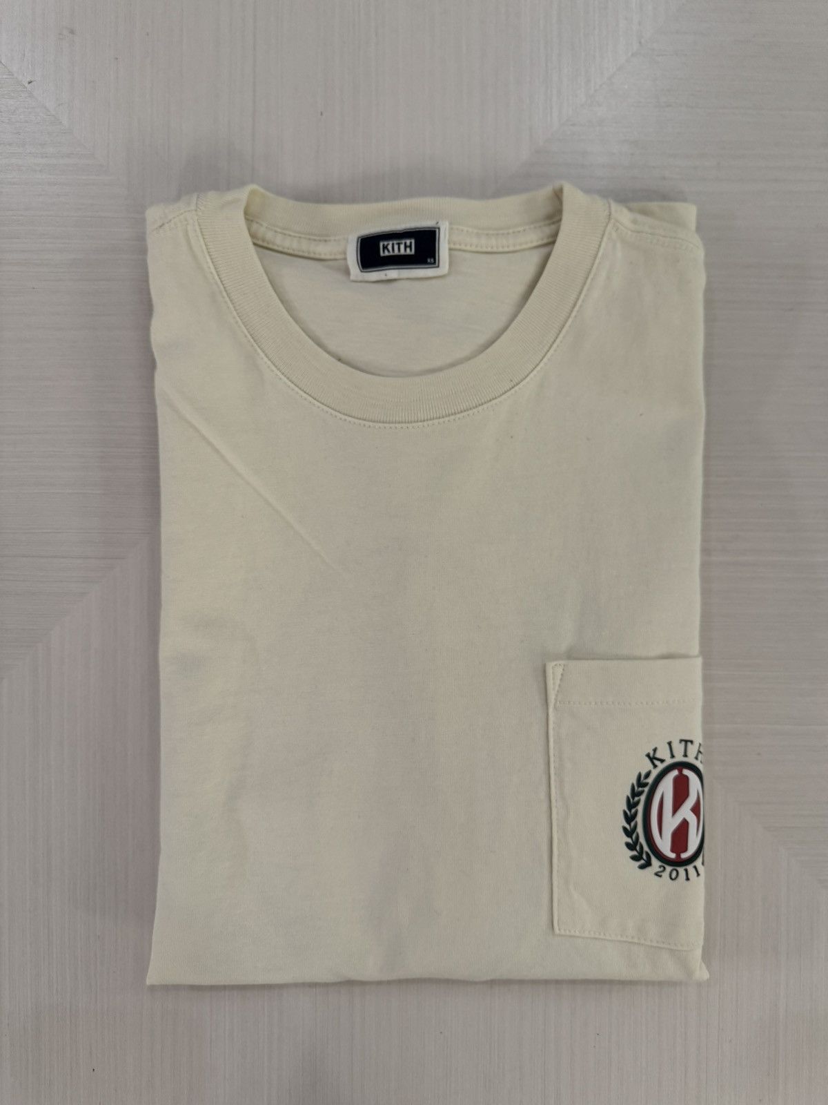 Kith Kith K shield pocket tee sandrift size XS used spring 2025 Size US XS / EU 42 / 0 - 1 Thumbnail