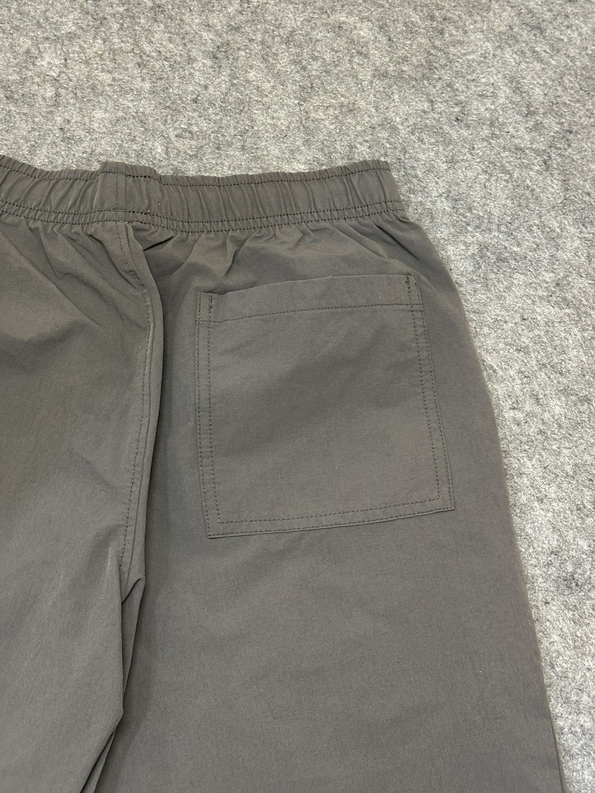 Puma PUMA dark grey track pants with a 3/4 length. Size US 30 / EU 46 - 7 Thumbnail