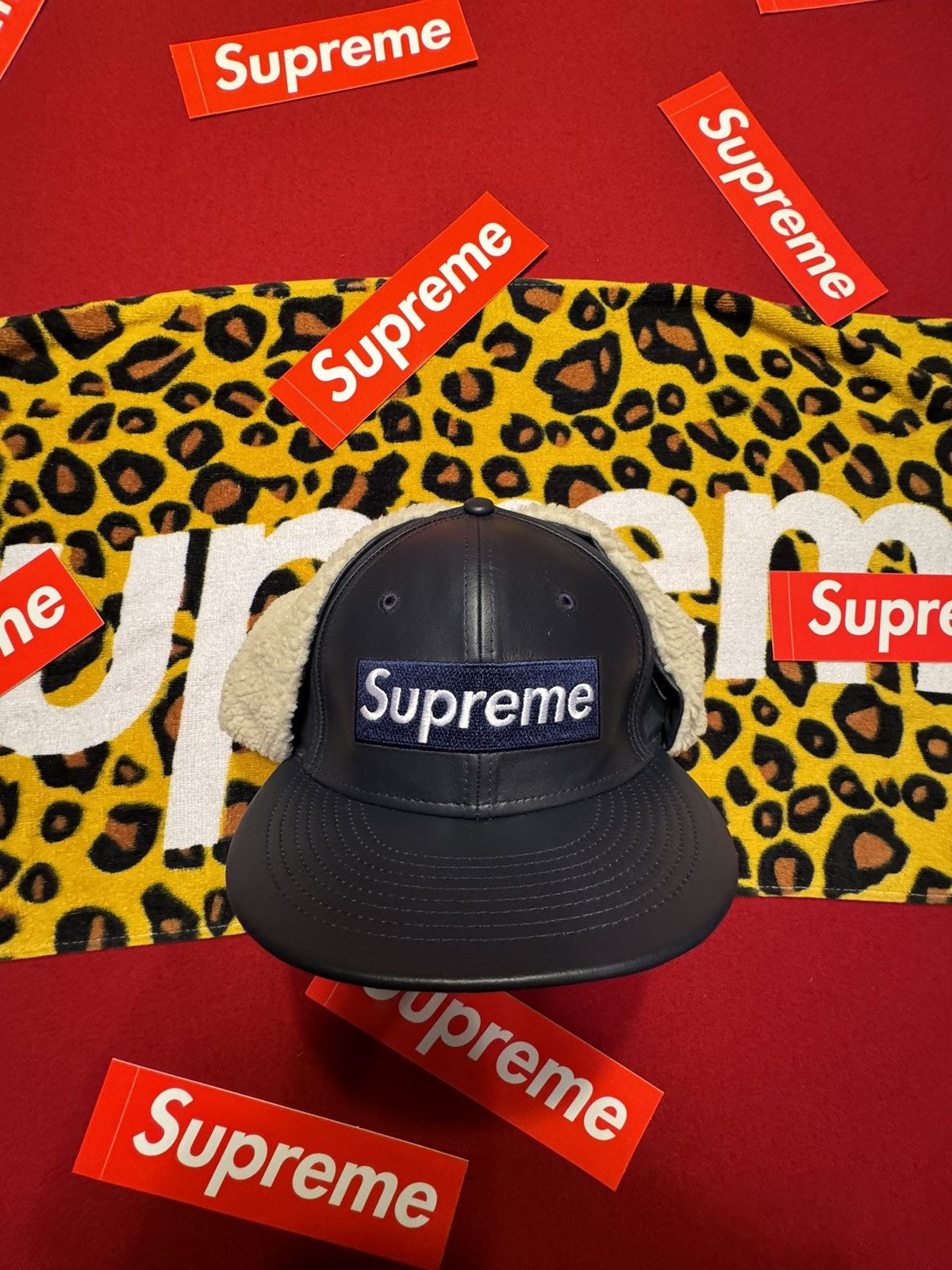 image of Supreme X New Era Box Logo Leather Ear Flap Fitted Hat in Light Navy, Men's