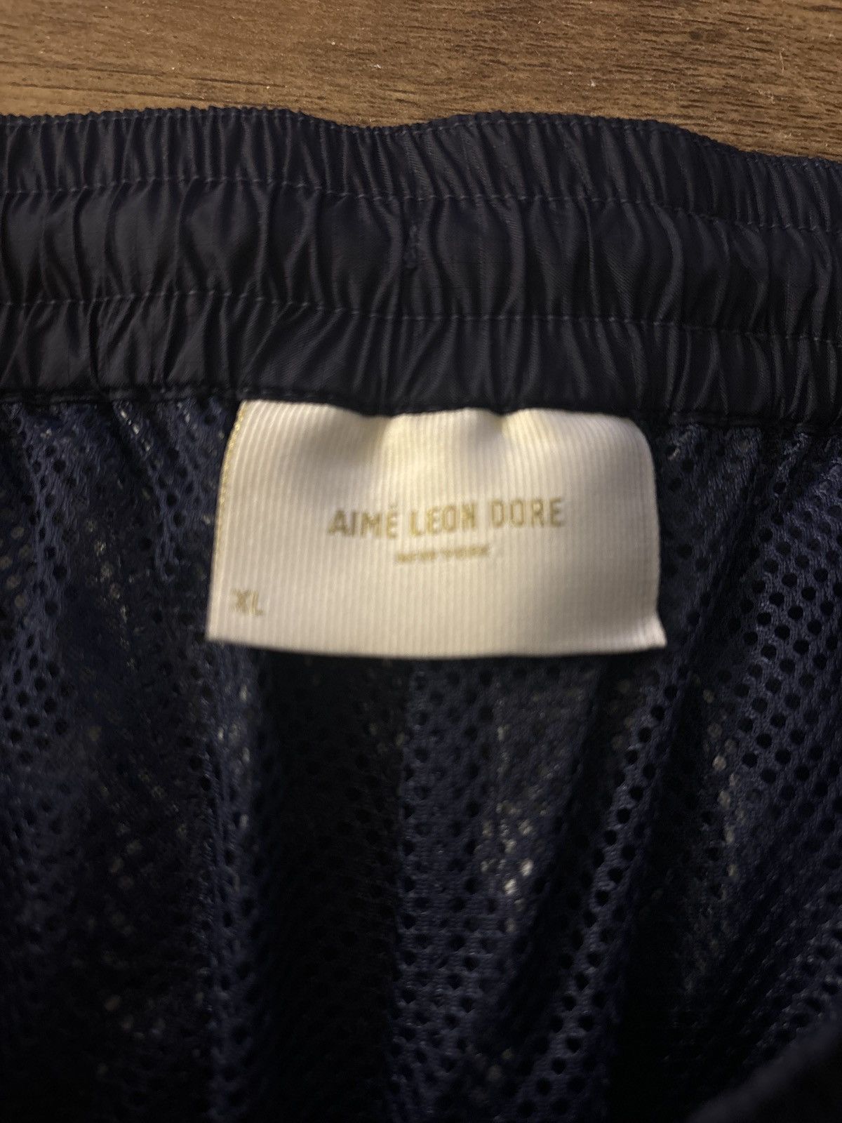 Aime Leon Dore micro logo navy track pants uniform