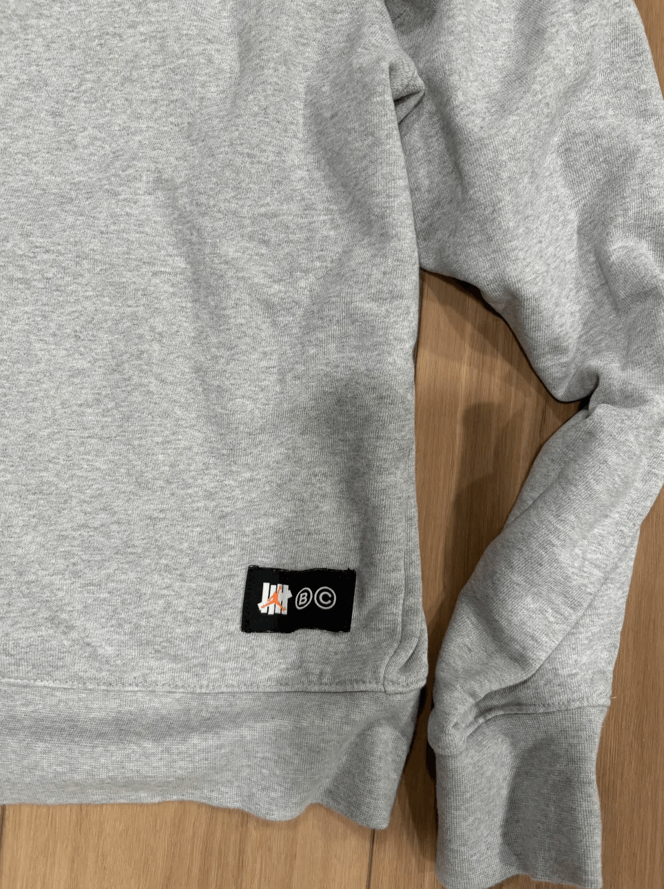 Jordan Brand × Undefeated Jordan x Undefeated Weights Hoodie Heather Grey Size US M / EU 48-50 / 2 - 7 Thumbnail