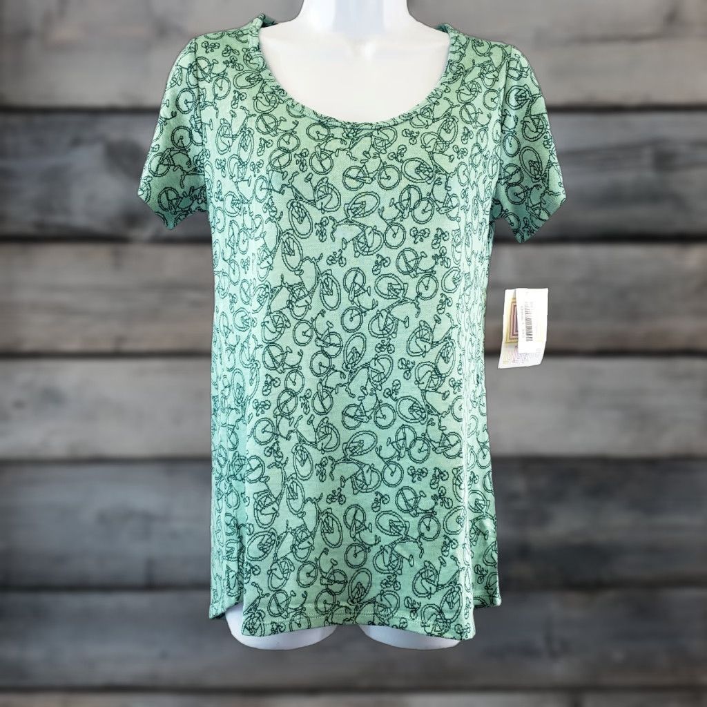 Vintage LuLaRoe Womens Classic T 2XS Green Bike Bicycle Print Short Sleeve Shirt Womens Green 2XS LuLaRoe Shirt Bike Print Size 24" / US 00 / IT 34 - 1 Thumbnail