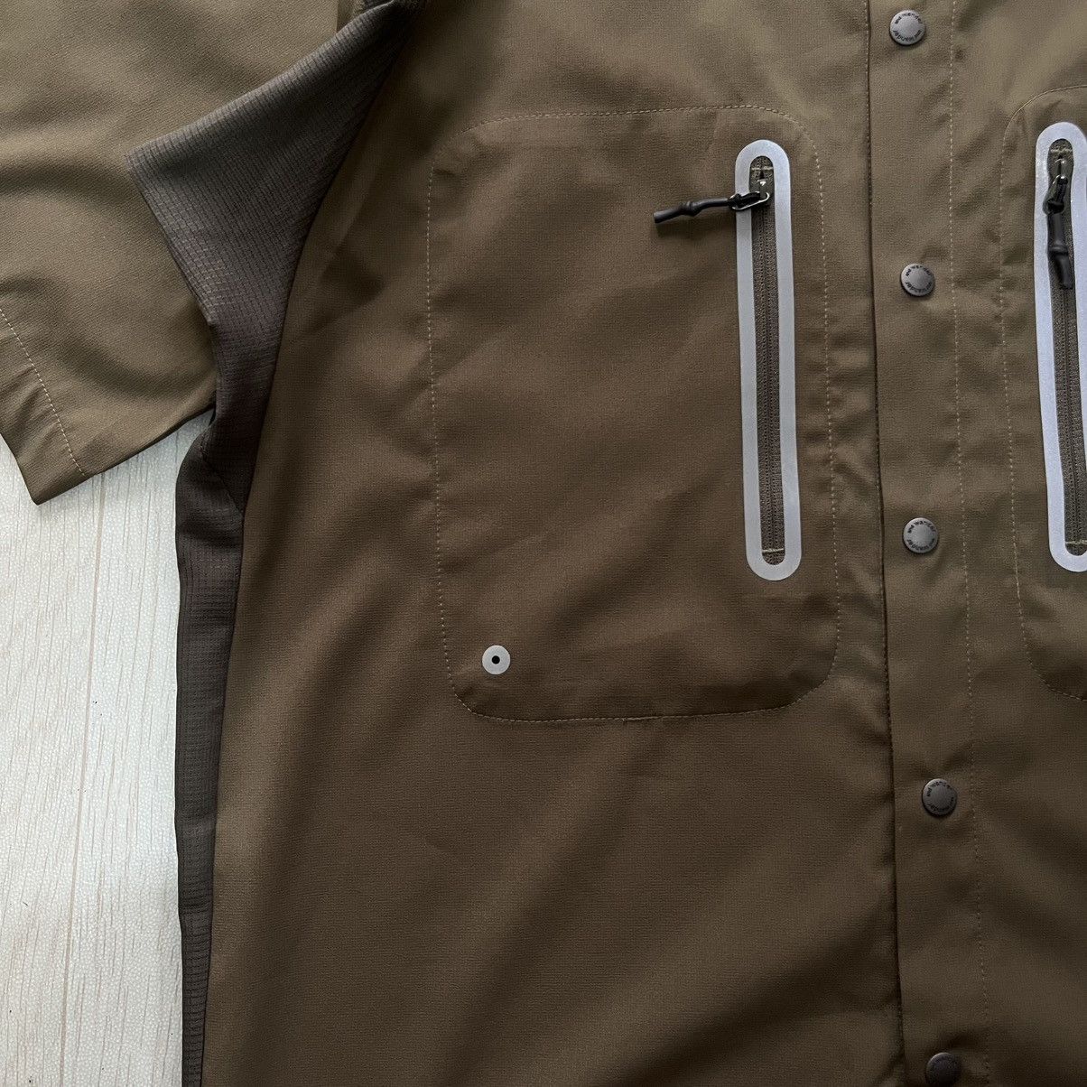 And wander logo printed panelled shirt olive green