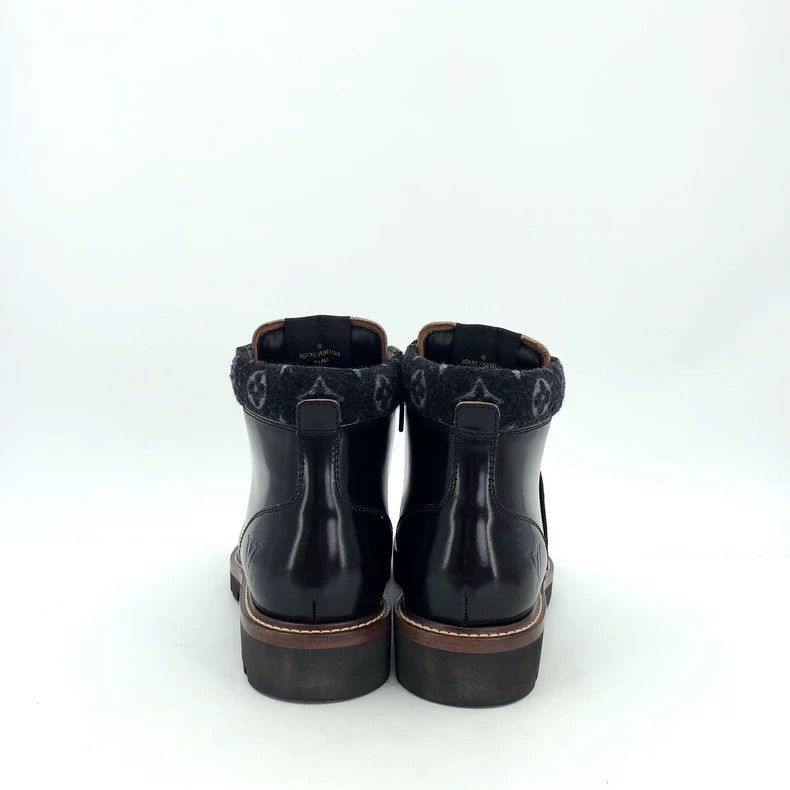 Louis Vuitton Black logo embossed leather lace-up Martin b