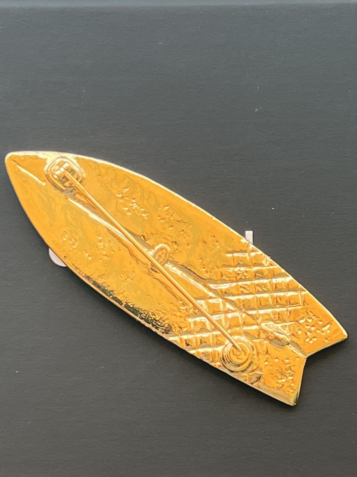 Amazing Chanel gold surfboard brooch.