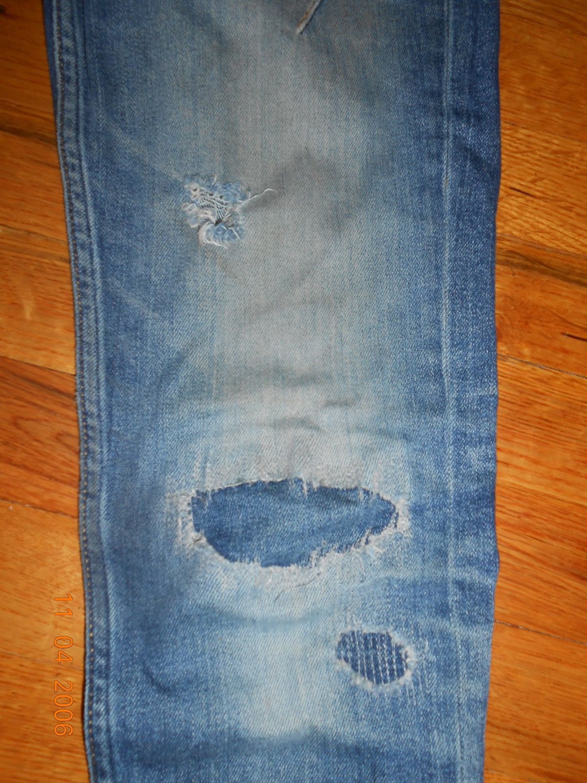 number (n)ine distressed repair denim