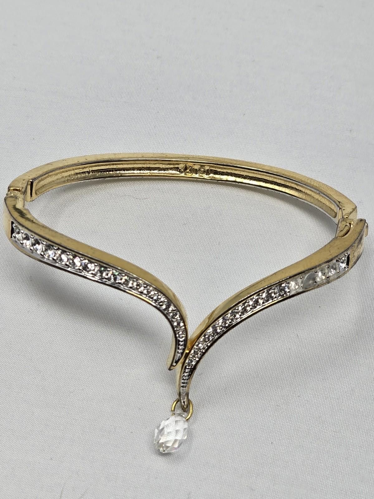Swarovski Vintage SWAROVSKI Signed Gold-tone Hinged V Bangle w/ dangle Size ONE SIZE - 1 Thumbnail