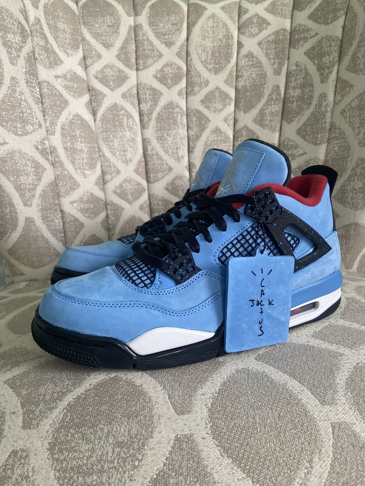 image of Jordan Travis Scott Jordan 4 Travis Scott ‘Houston Oilers’ Shoes in Blue, Men's (Size 8.5)