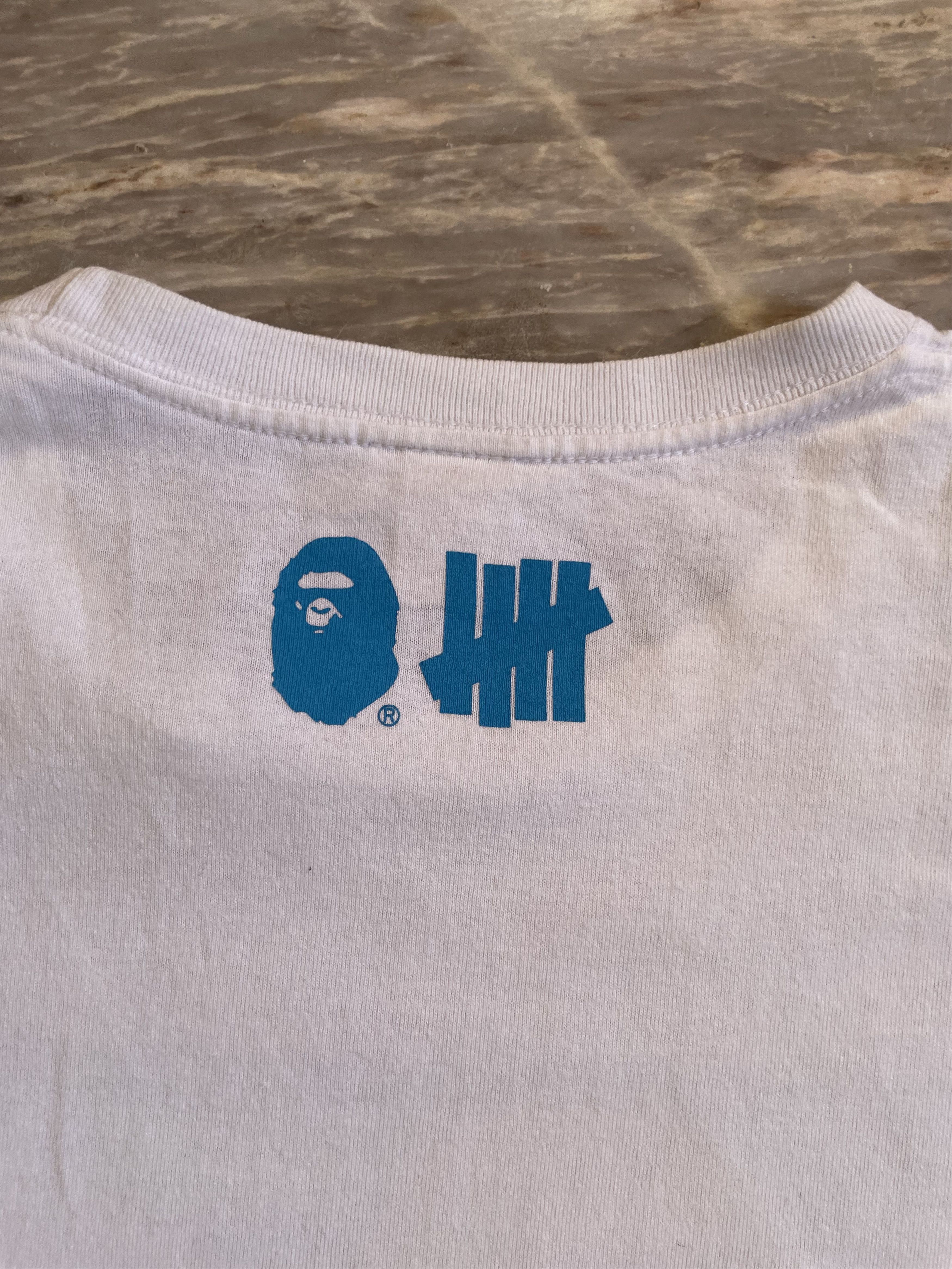 Bape × Nigo × Undefeated Bape x Undefeated Surfing Ape Tee Size US L / EU 52-54 / 3 - 10 Thumbnail