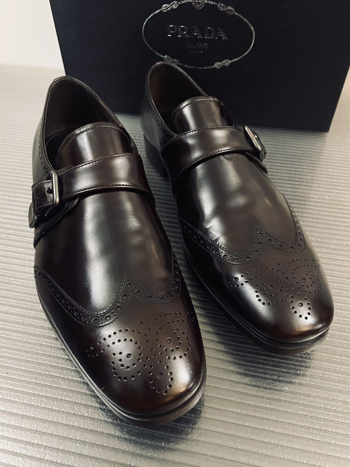 Prada Prada 🇮🇹 Bruciato wingtip toe medallion buckle loafer 11 NEW Size US 11 / EU 44 - 1 Thumbnail