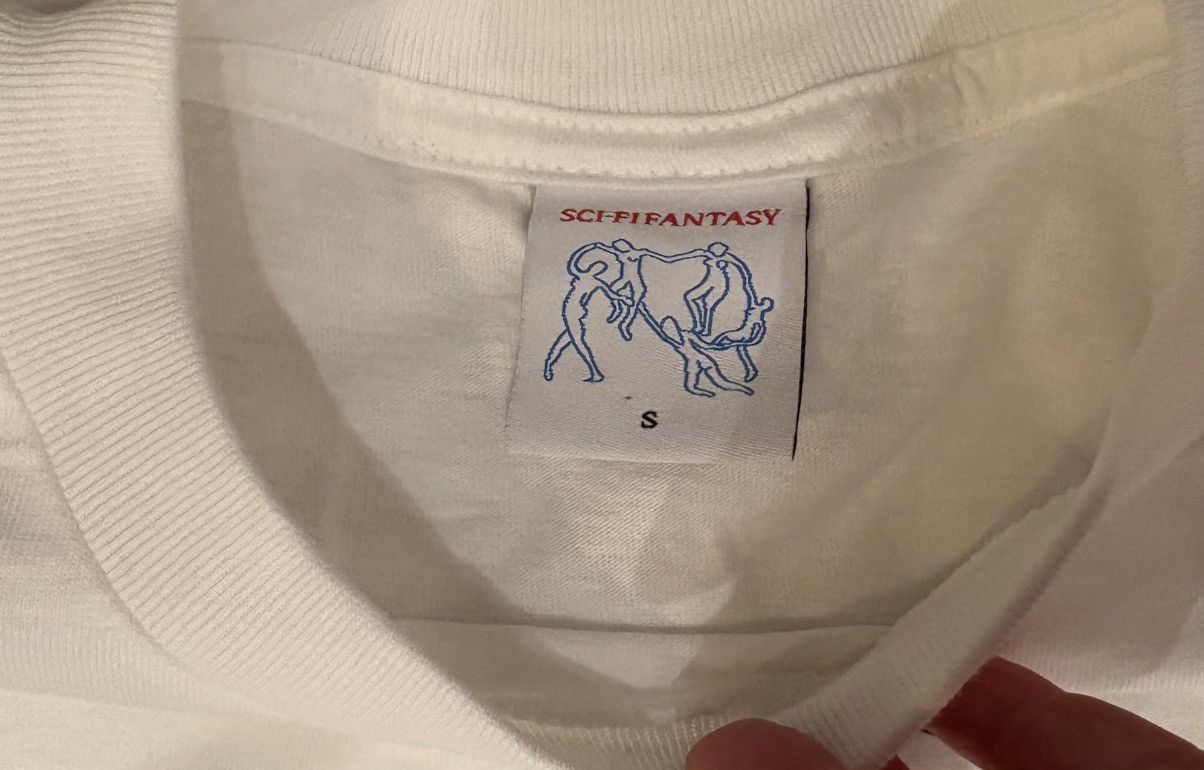 Sci-Fi Fantasy Sci-Fi Fantasy Neoliberal Hellscape Tee Cream Sz S Size US S / EU 44-46 / 1 - 5 Thumbnail