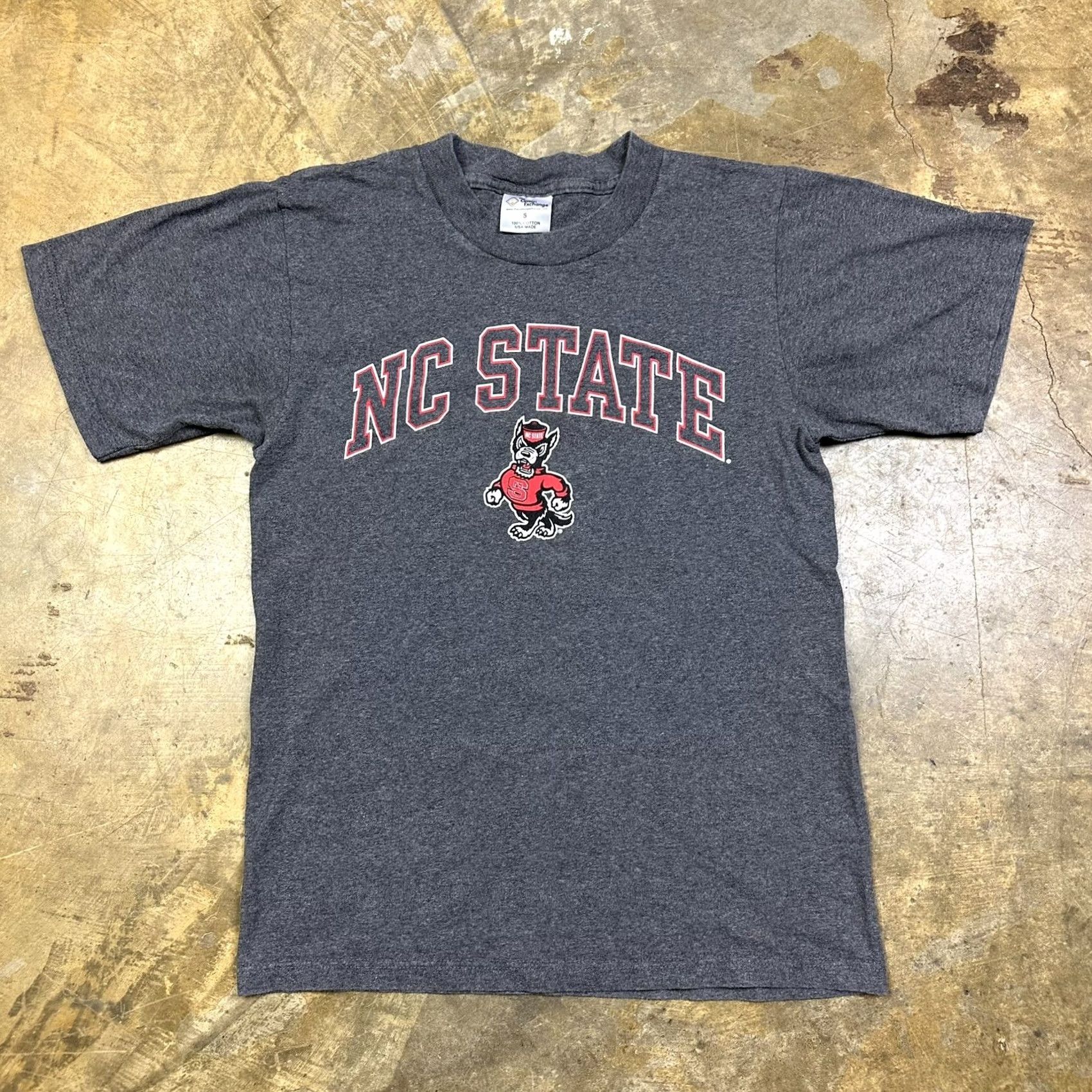 Vintage VINTAGE The Cotton Exchange NC State Wolfpack Graphic T-Shirt Unisex Adults Small Gray 90s Front Graphic Made USA Size US S / EU 44-46 / 1 - 3 Thumbnail