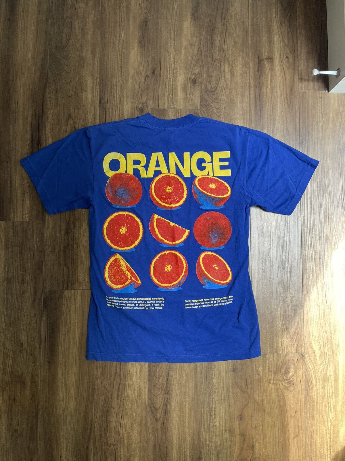 atthemoment Bold Blue “ORANGE” Fruit Graphic Tee – AttheMoment (Size S) Size US S / EU 44-46 / 1 - 1 Thumbnail