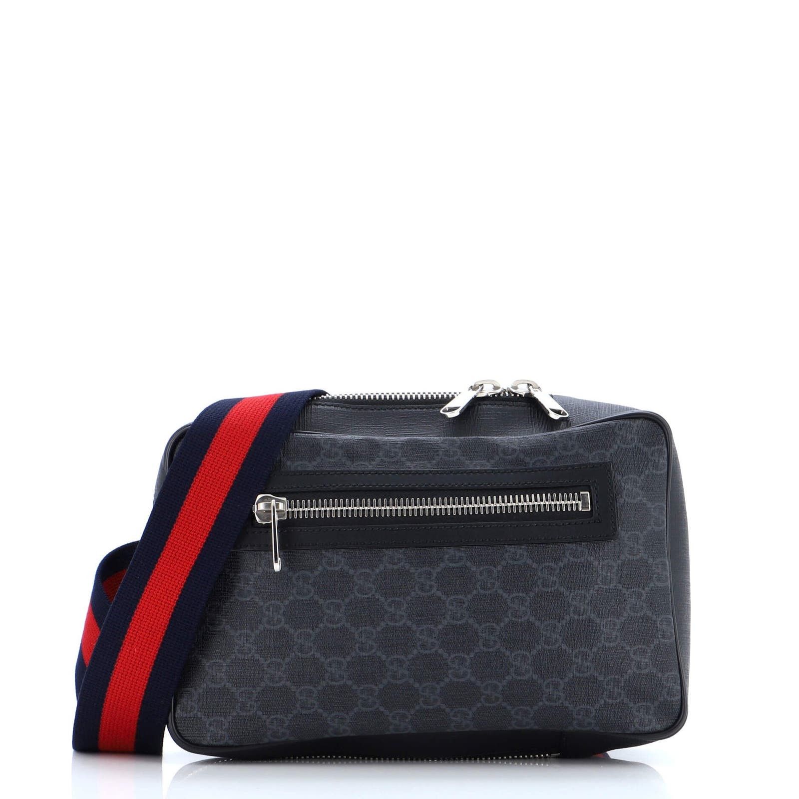 image of Gucci Soft Zip Sling Bag GG Coated Canvas Small in Black, Women's