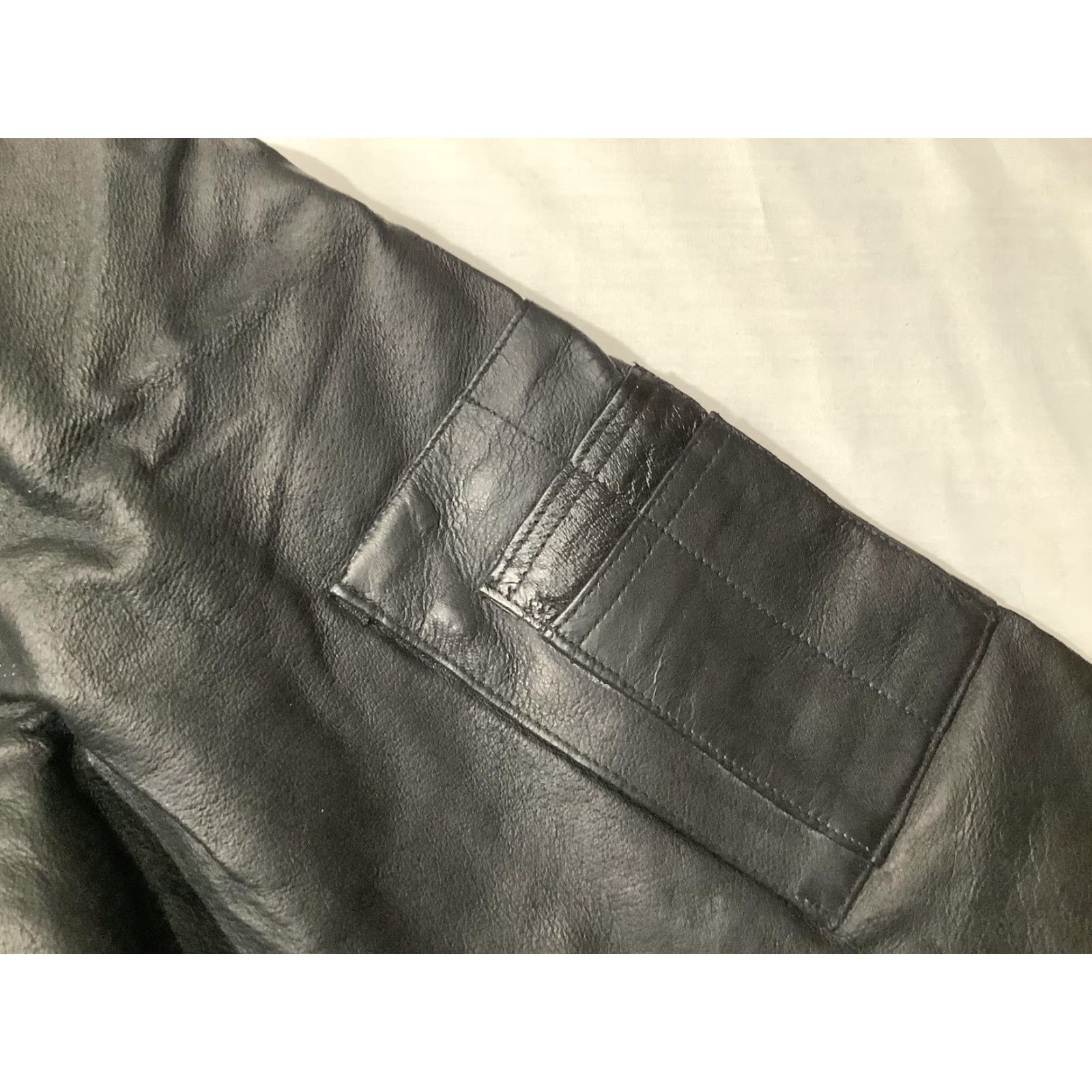 Vintage Ferugini Bomber Jacket Mens Small Black Genuine Leather Back Patch US Army Embroidered Zipper Full Zip Lined Pockets Elastic Waist Army USA Theme Size US S / EU 44-46 / 1 - 7 Thumbnail