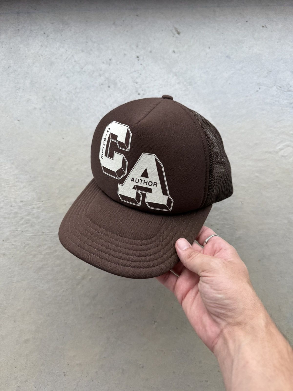 Travis Scott Circle Author Brown Trucker Hat Size ONE SIZE - 1 Thumbnail