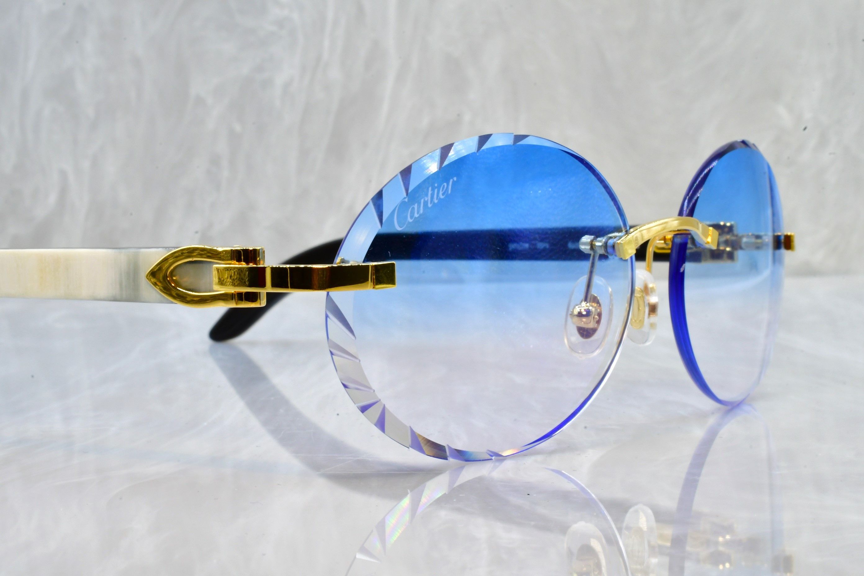 Cartier diamond cut white horn sunglasses C decor buffs