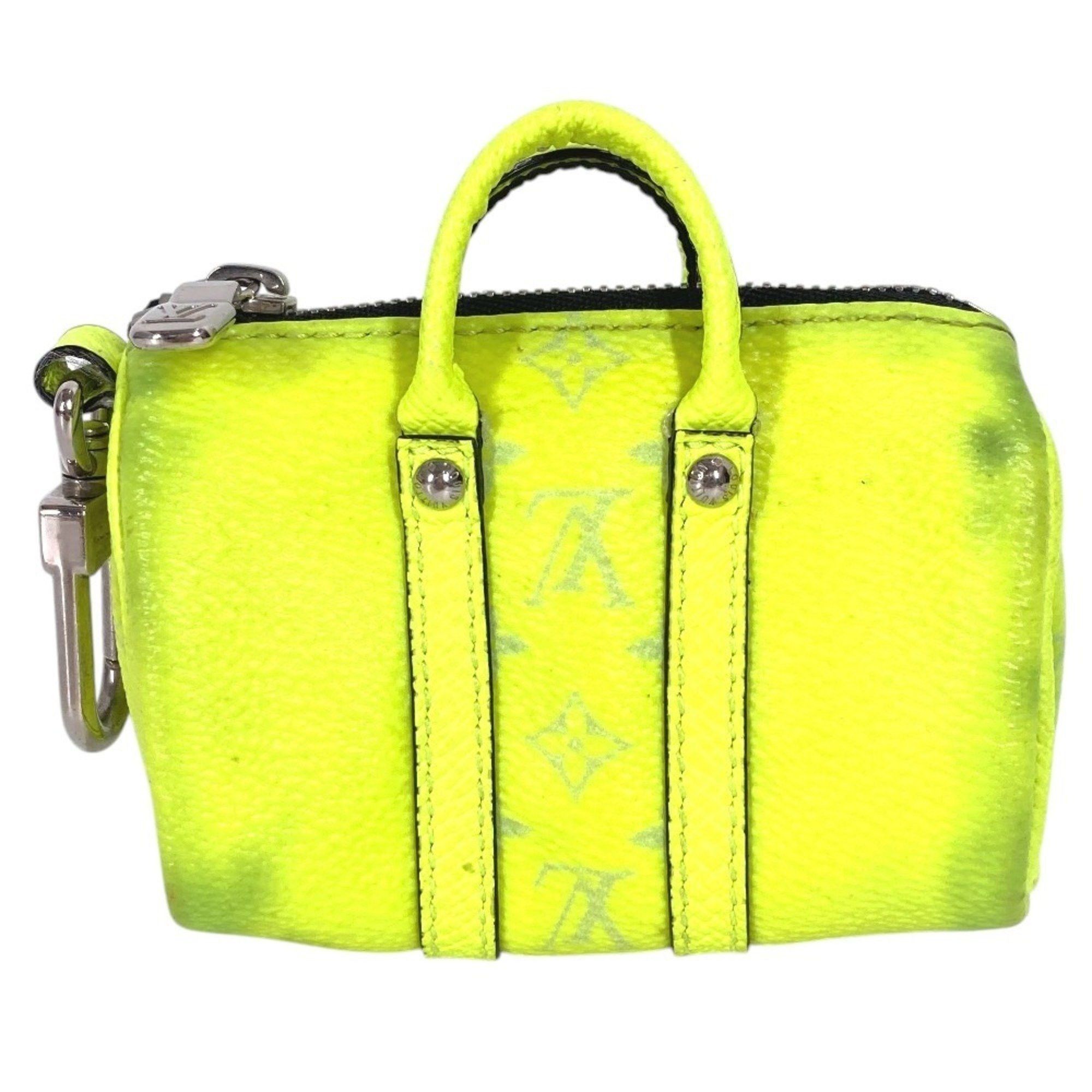 Louis Vuitton LOUIS VUITTON M01048 Taiga Rama Porte-Clés Mini Keepall Bag Charm, Boston Keychain, Leather and Monogram Canvas, Yellow, for Men Women Size ONE SIZE - 1 Thumbnail
