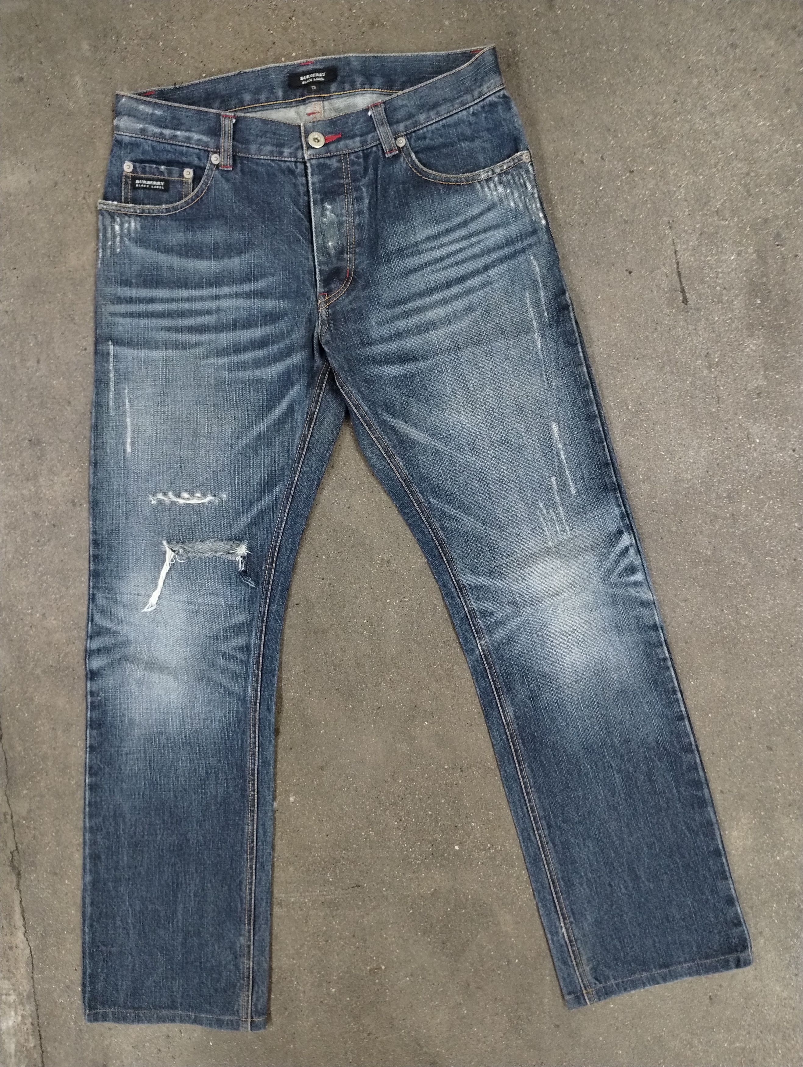 image of Burberry Black Label Disstressed Denim in Blue, Men's (Size 30)