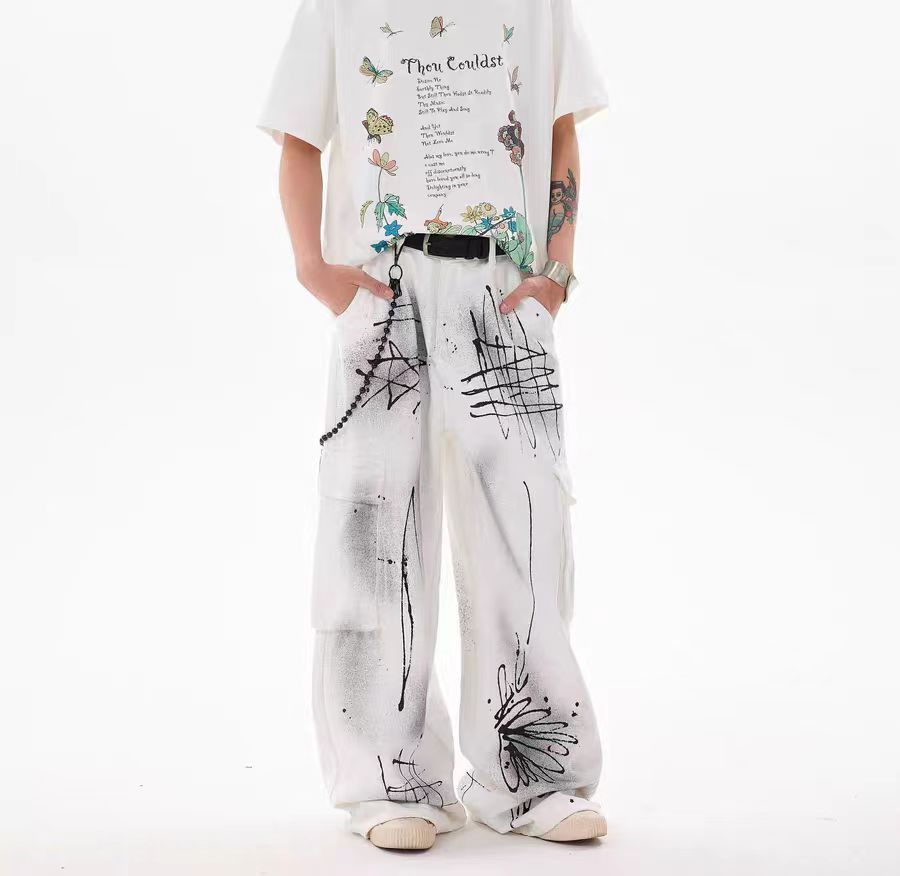 White baggy jeans with graffiti