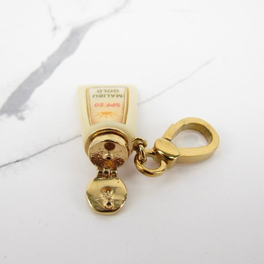 Juicy Couture Juicy Couture Malibu Gold Tan Oil Charm Size ONE SIZE - 6 Thumbnail