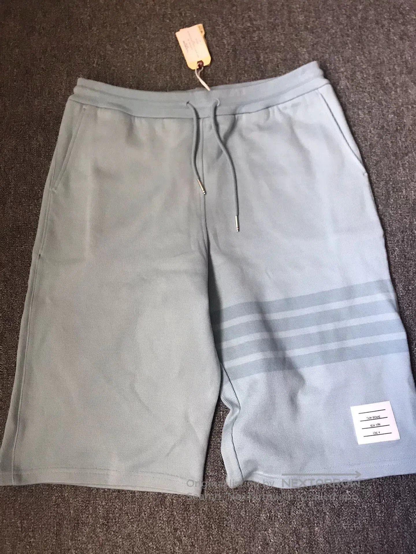 Thom Browne Light Blue Cotton Shorts.