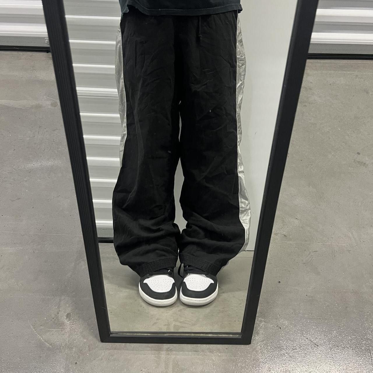 Vintage Vintage Y2K/2000s Baggy Black And Silver Striped Sreetwear Track Pants with adjustable Waistband, drawstrings , and back pocket! Size US 30 / EU 46 - 1 Thumbnail