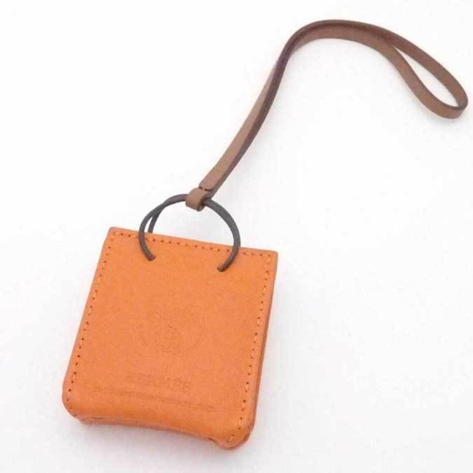 image of Hermes Charm Sack Orange Leather X Brown Unisex in Black, Women's