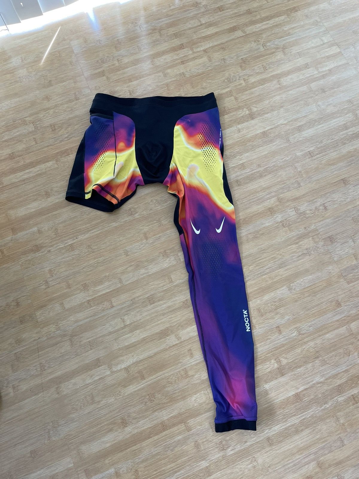 image of Nike X Nocta Compression Leg Sleeve (Left) in Purple, Men's (Size 31)