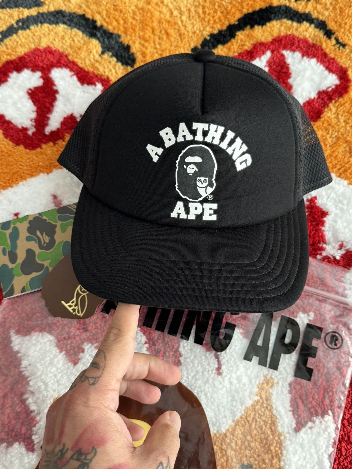 image of Bape Ovo Cap Trucker Cap in Black, Men's