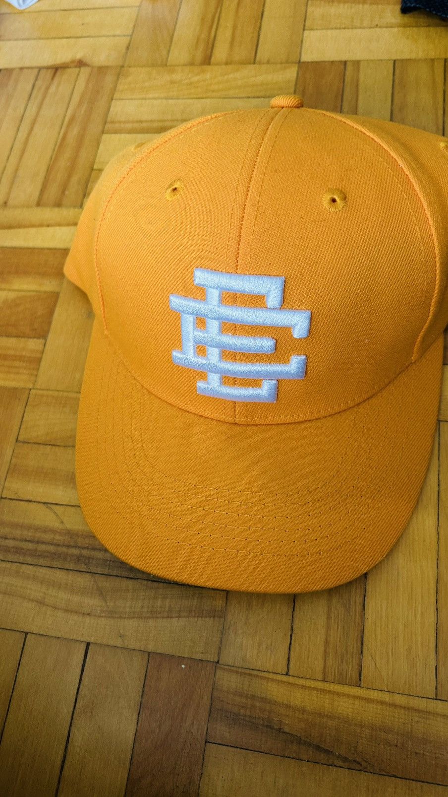 Eric Emanuel yellow snapback