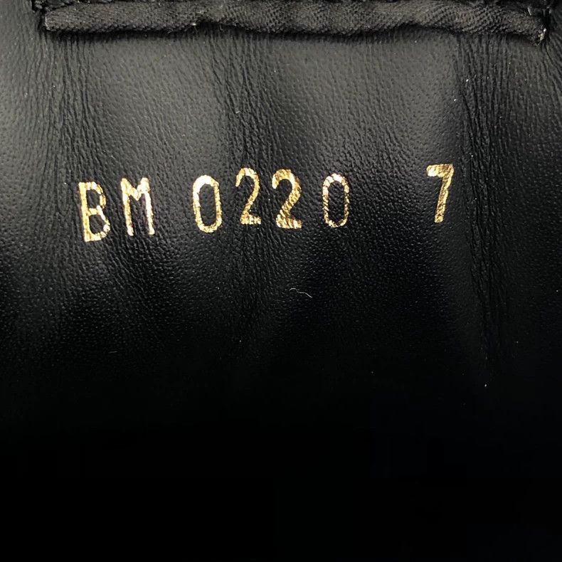 Louis Vuitton Black logo embossed leather lace-up Martin b