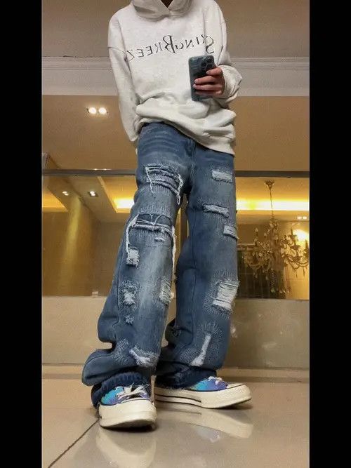 damaged distressed patch baggy jeans