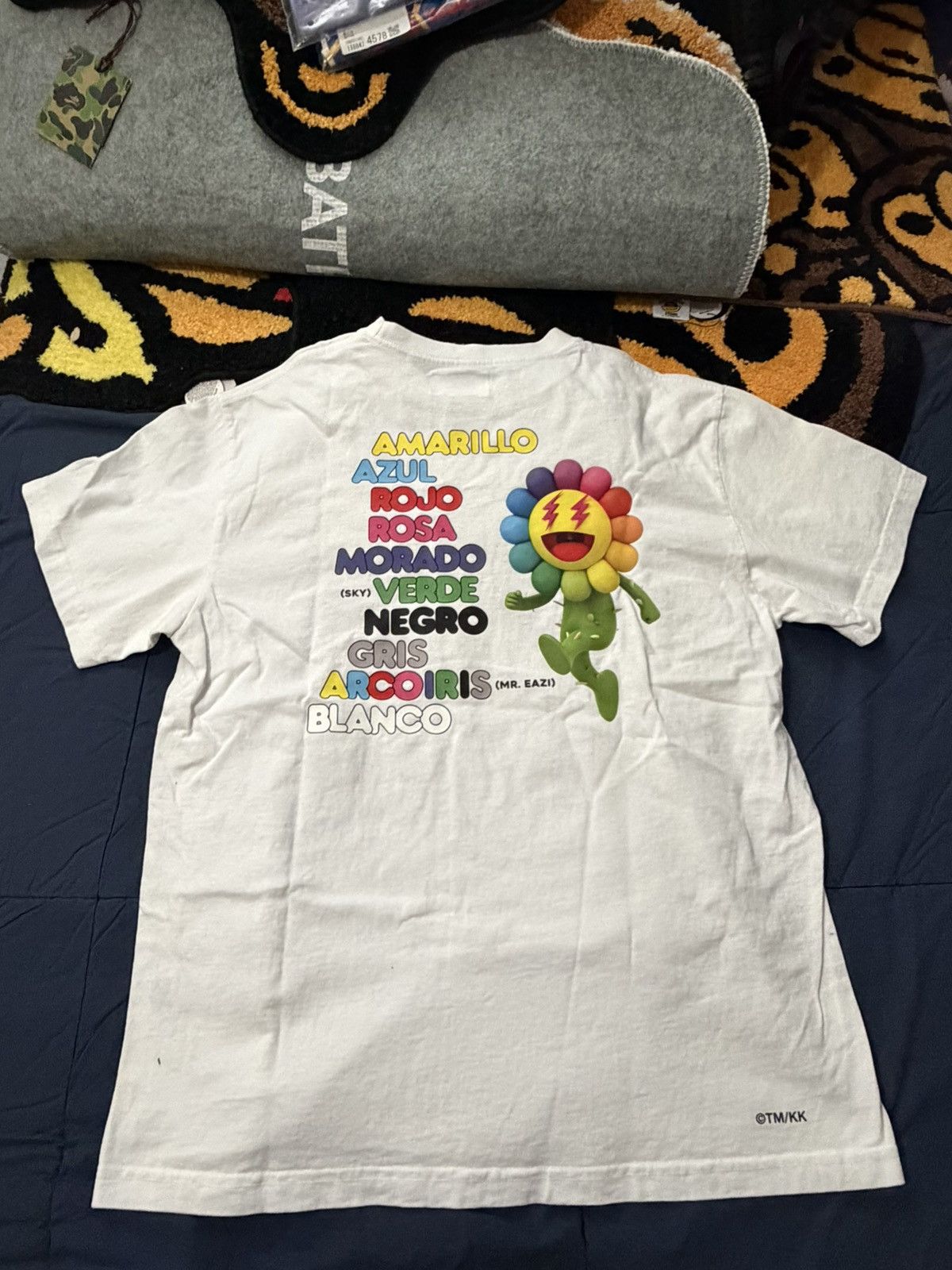 Takashi Murakami Takashi Murakami-J Balvin Tee. White used worn once. Colores Size US L / EU 52-54 / 3 - 5 Thumbnail