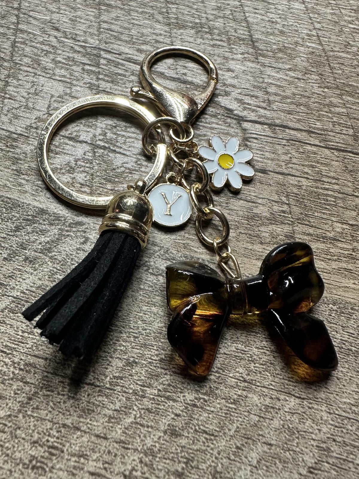Unknown London Keychain with Black Tassel, Daisy, and Tortoiseshell Bow Size ONE SIZE - 1 Preview