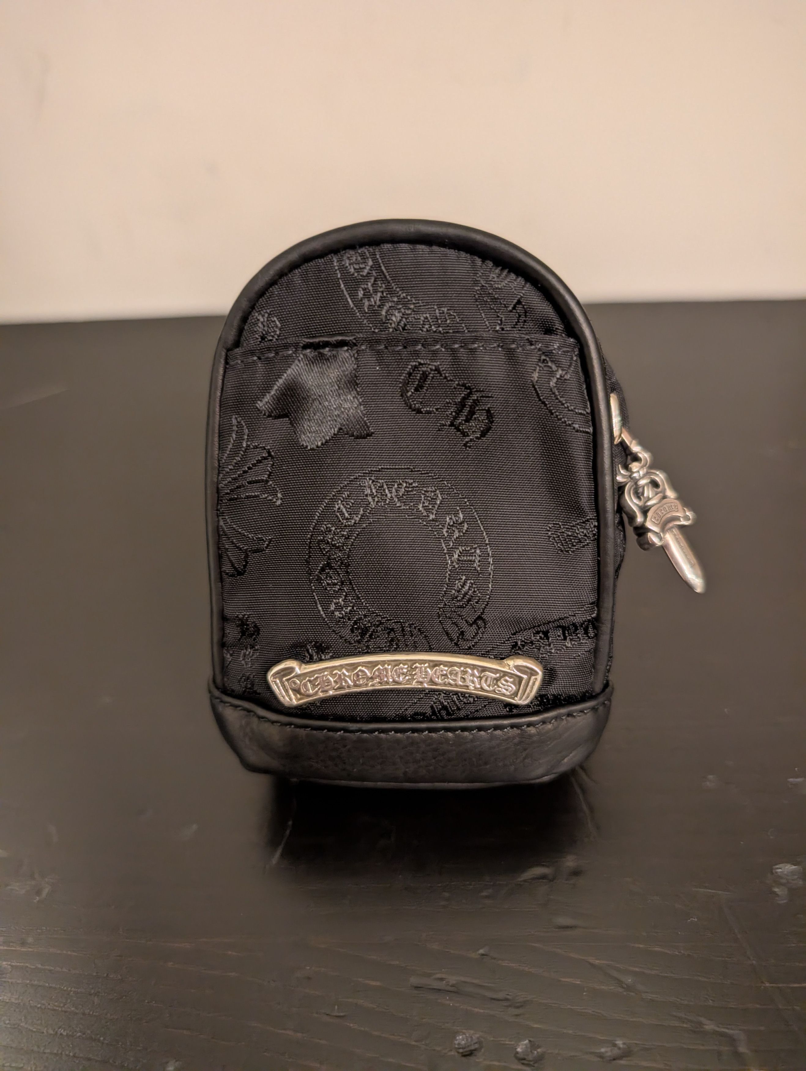 Stencil nylon backpack wrist bag
