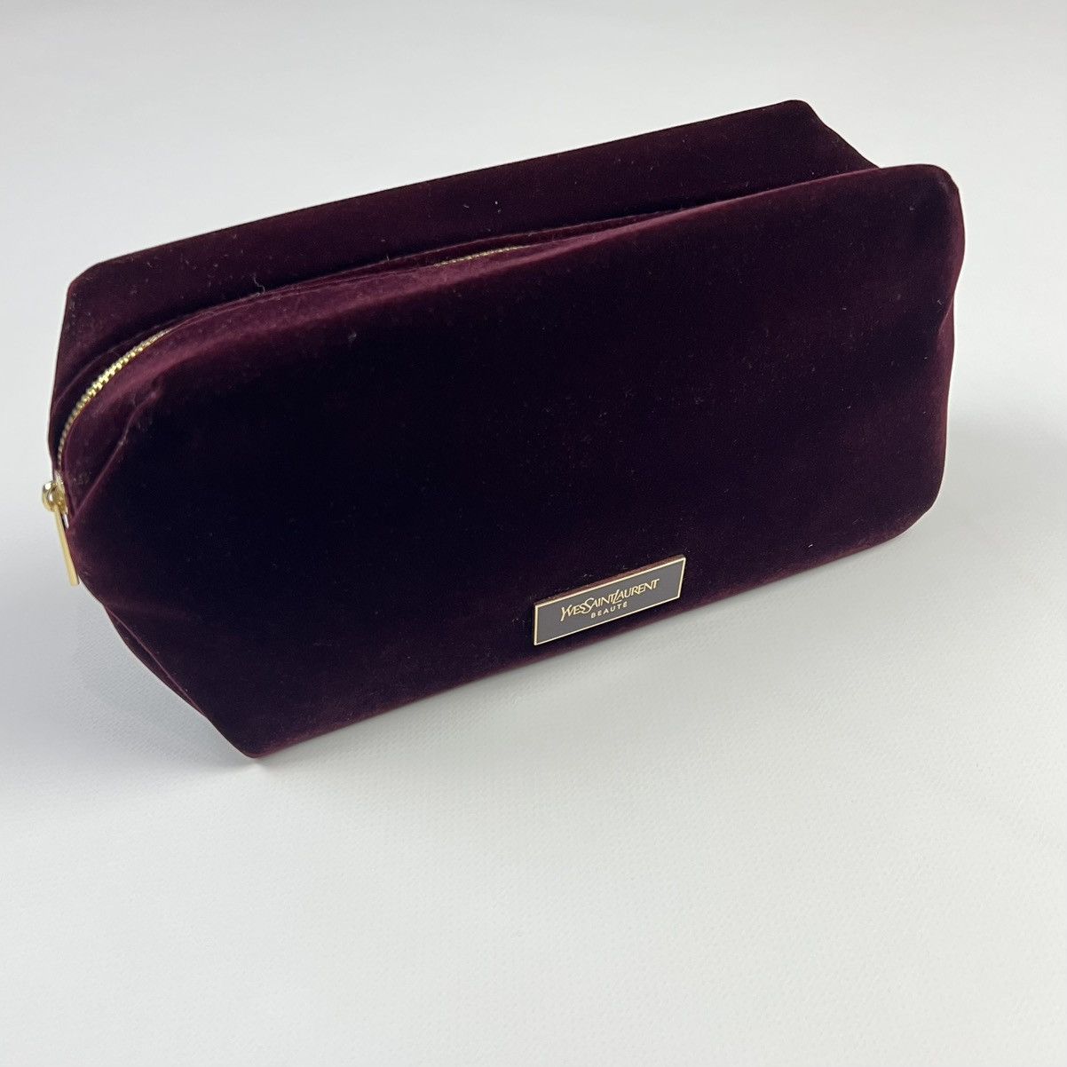 Burgundy velour Yves Saint Laurent beaute pouch