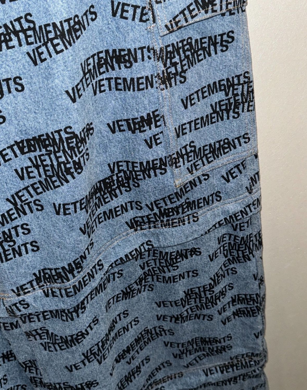 All over stamped logo transformer jeans