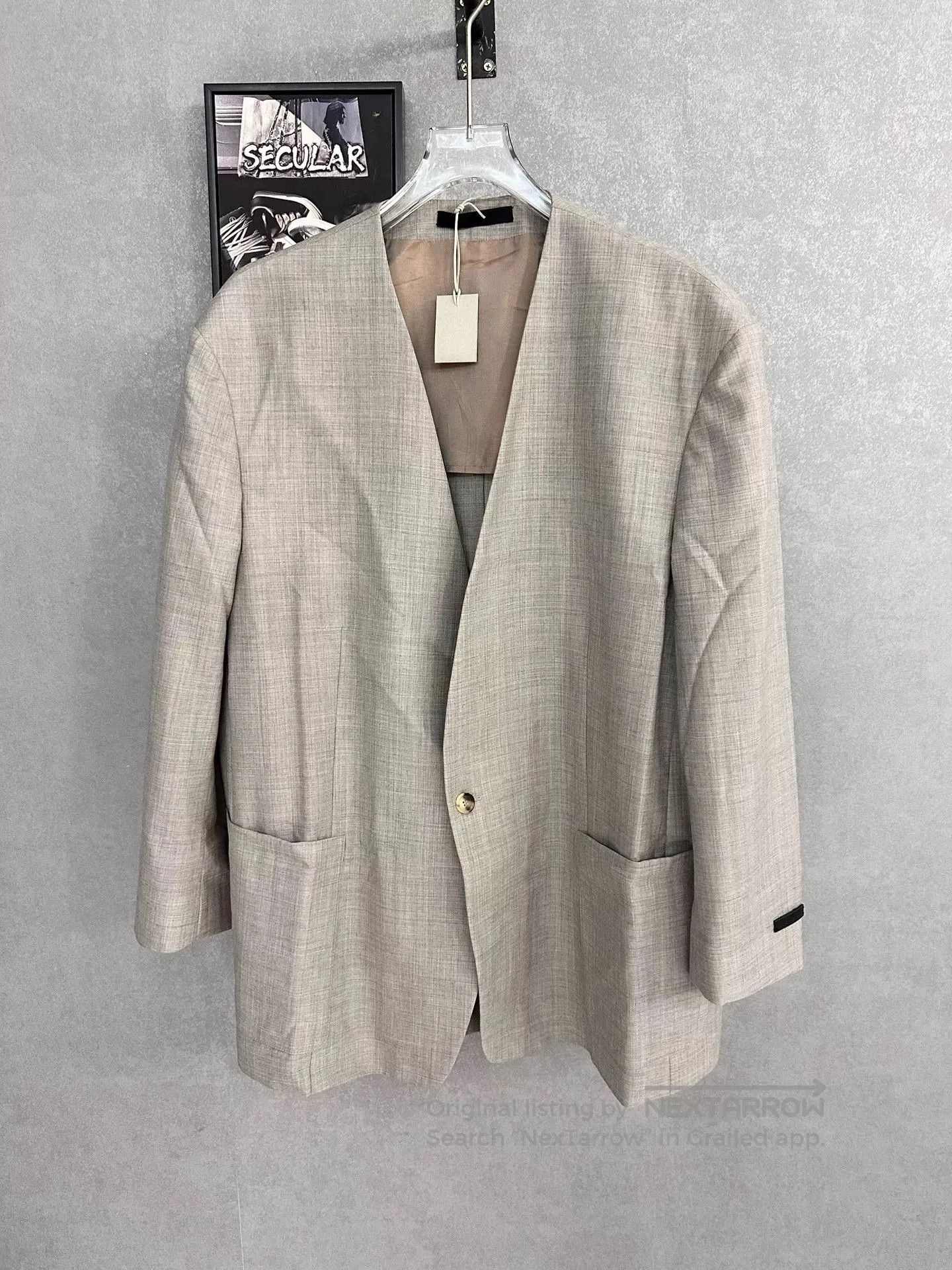 gray wool blazer with silk lining.