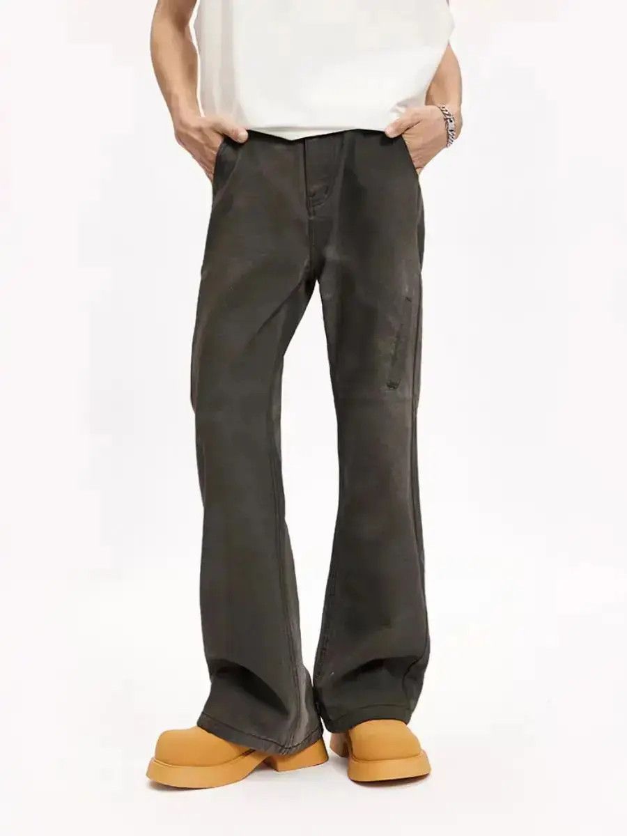 Paint-smeared dirty jeans with hipster design