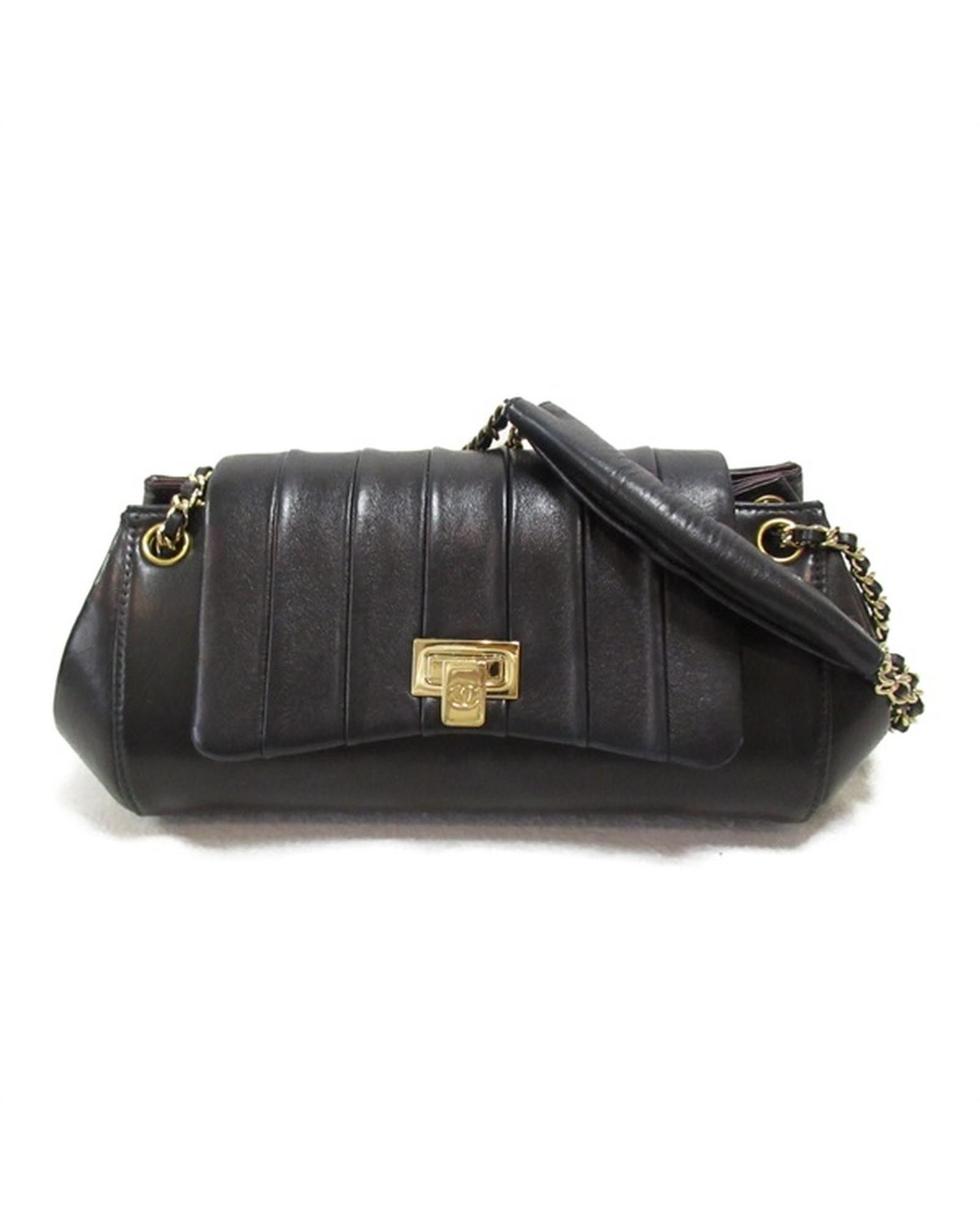 image of Black Accordion Flap Bag By Mademoiselle Chanel, Women's