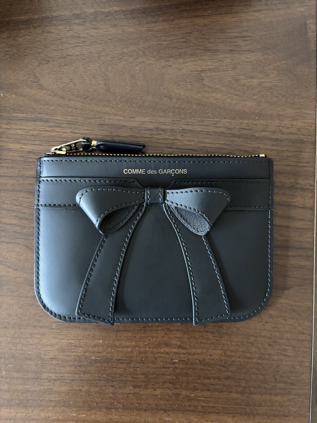 Comme des Garcons CDG Bow Wallet in Black Size ONE SIZE - 1 Thumbnail