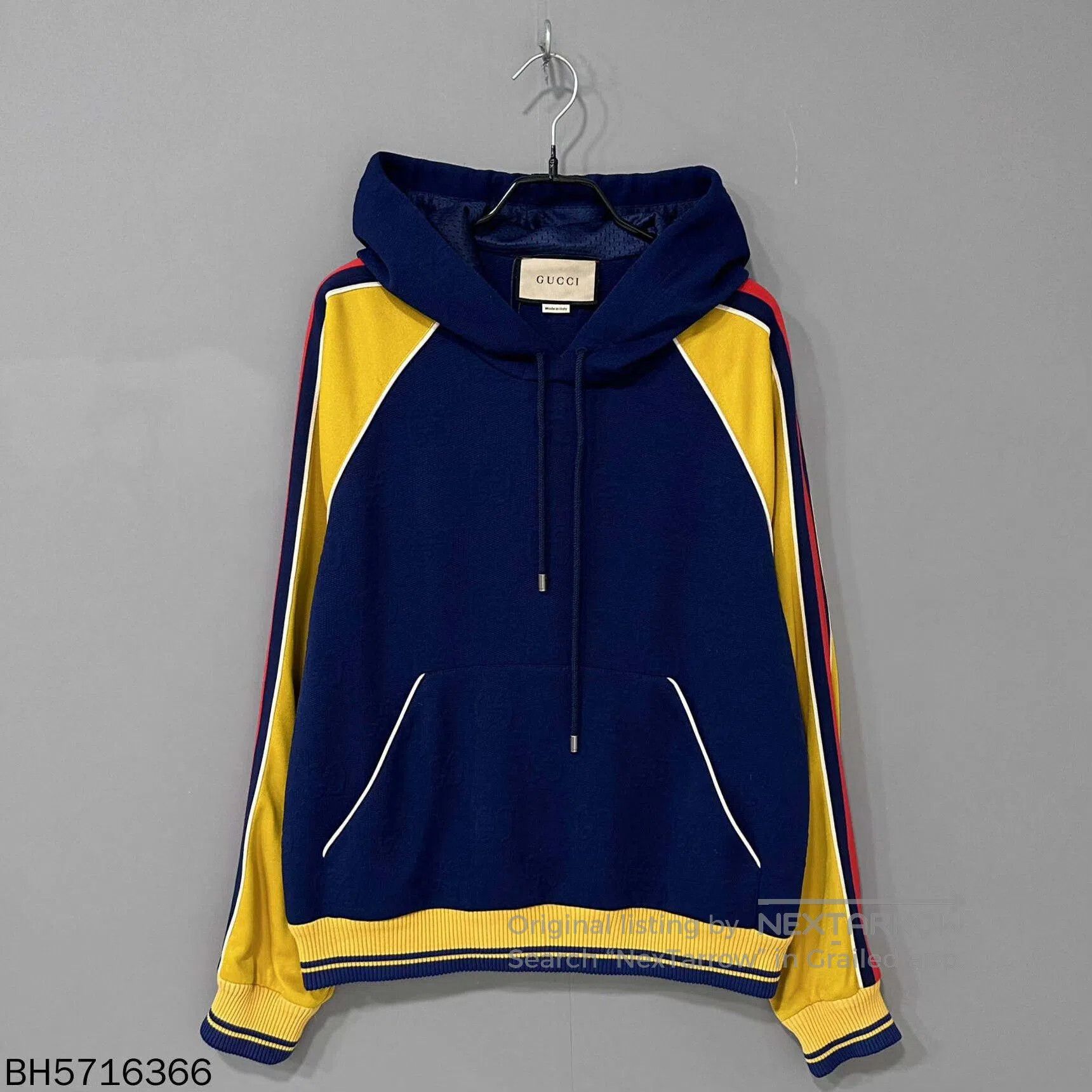 gucci logo print hoodie in blue and yellow.