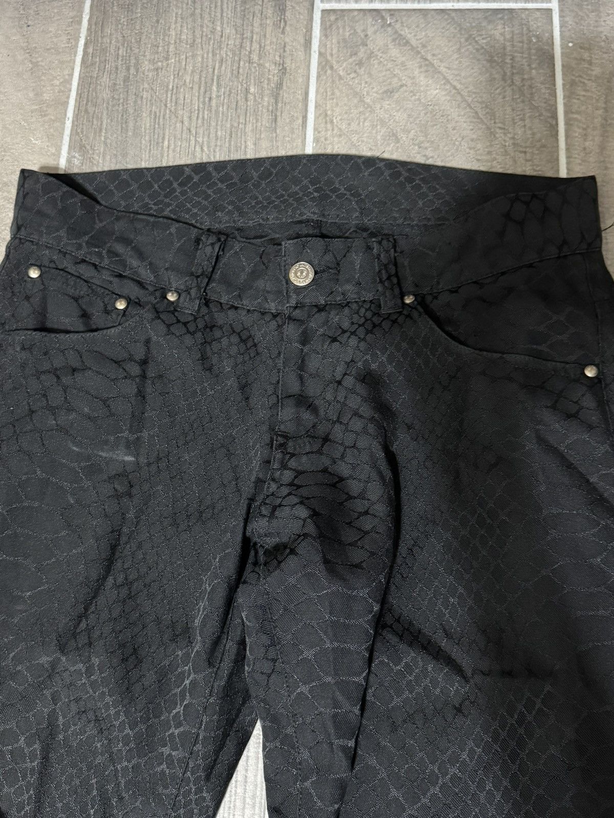 Tornado Mart flared croc jeans
