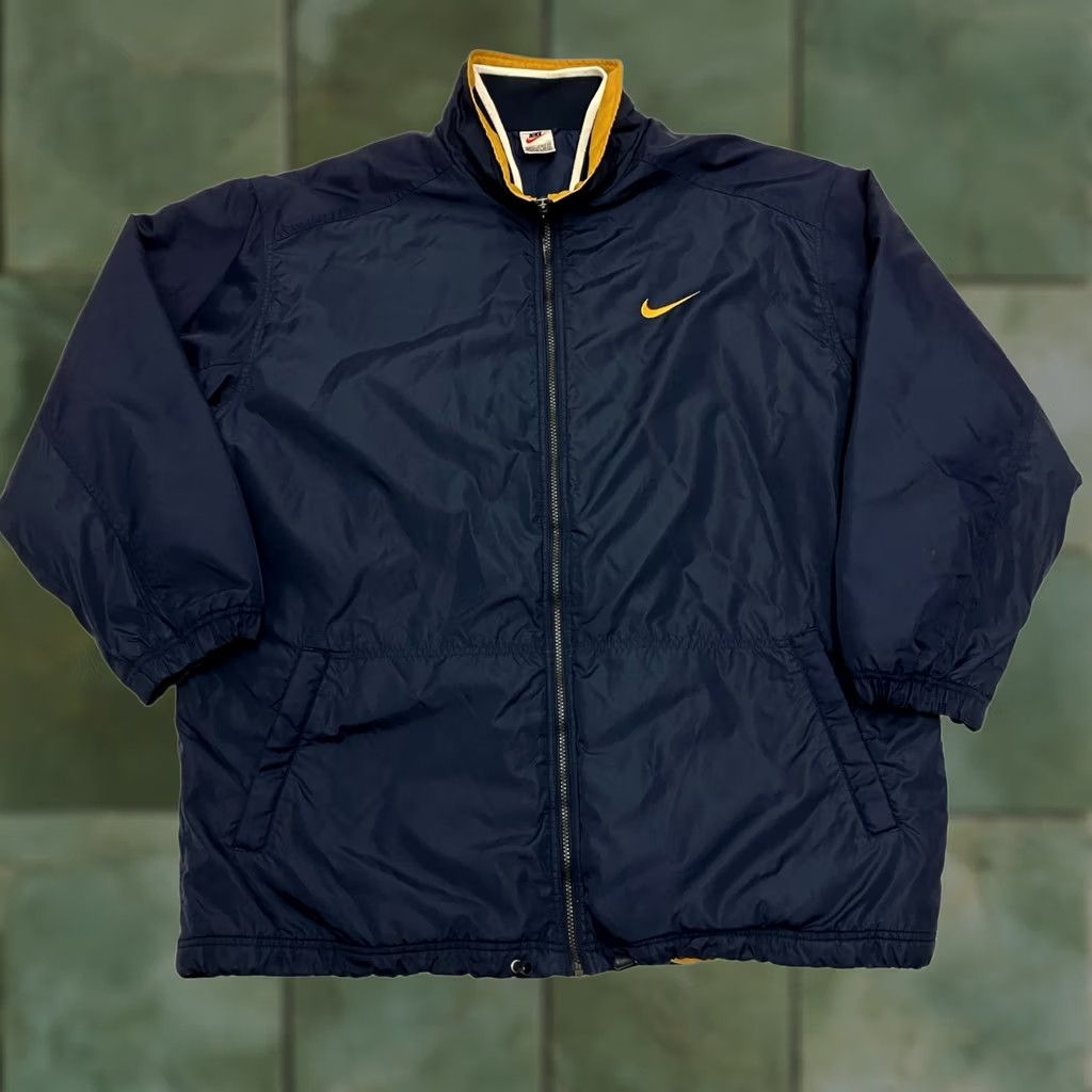 Nike VINTAGE Nike Padded Jacket Mens XL Navy Blue Yellow Spell Out Swoosh Coat Size US XL / EU 56 / 4 - 1 Thumbnail
