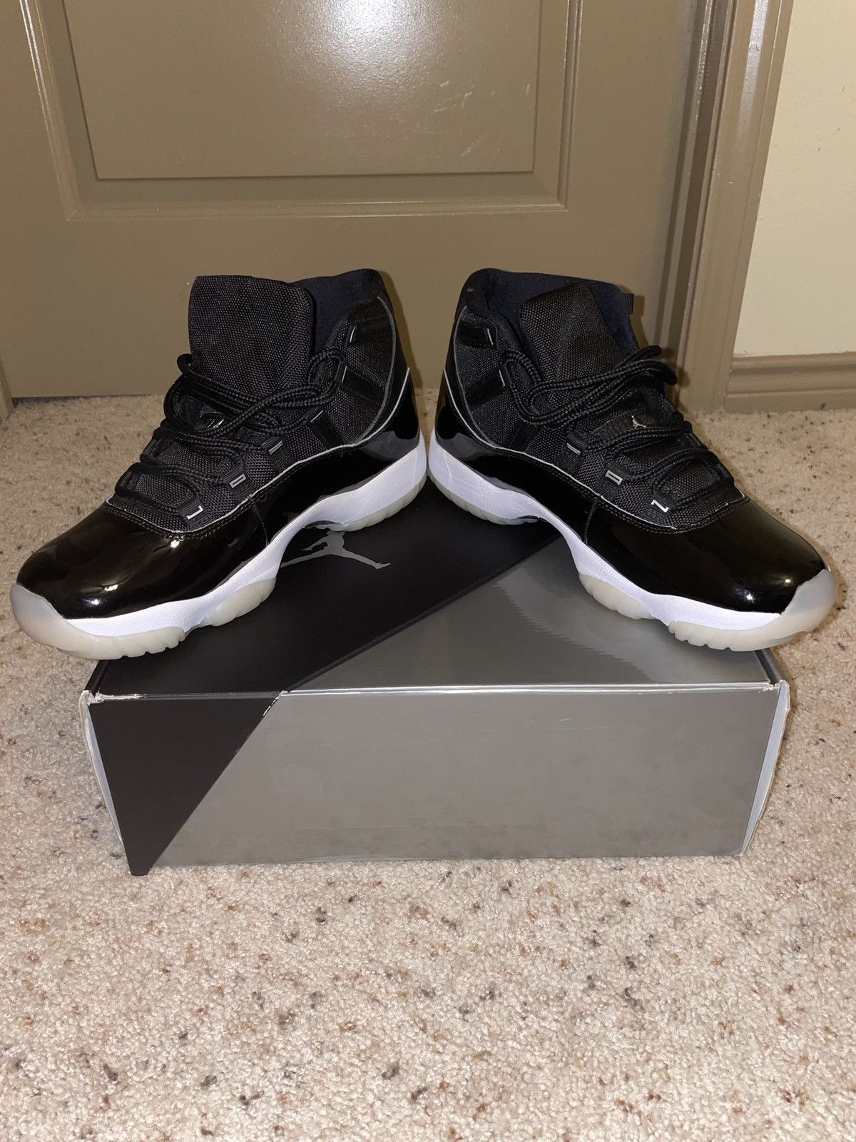 image of Air Jordan Retro 11 ‘Jubilee/25Th Anniversary’ Shoes in Black/White, Men's
