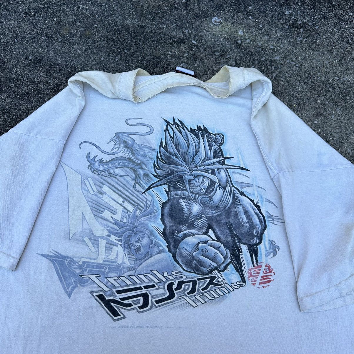 image of Archival Clothing x Avant Garde Vintage 2001 Dragonball-Z “Trunks” Distressed Anime Tee in Cream (S