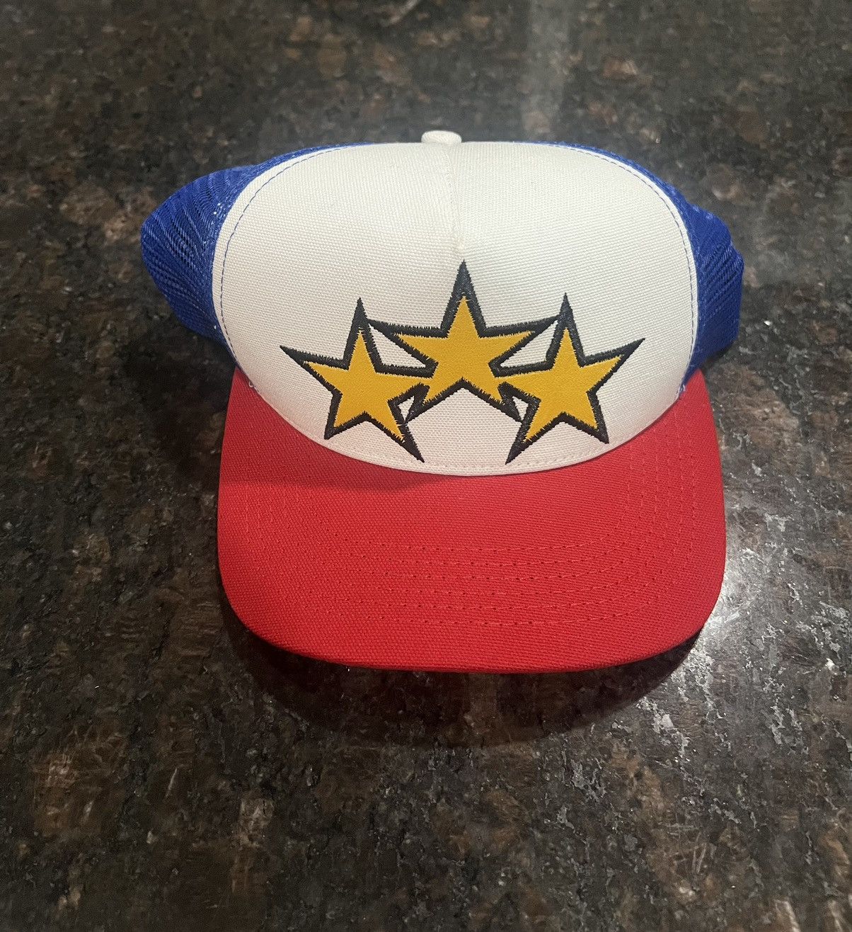image of Amiri Three Star Trucker in White, Men's