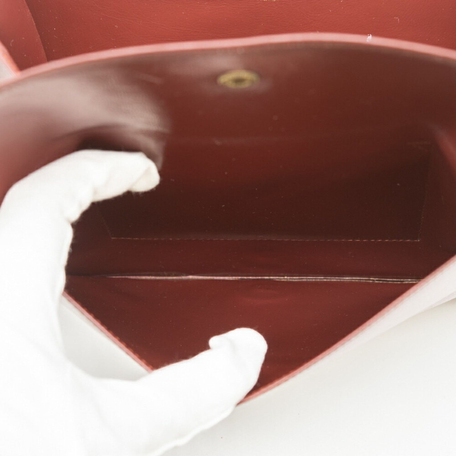 Cartier Others Red Clutch Bags